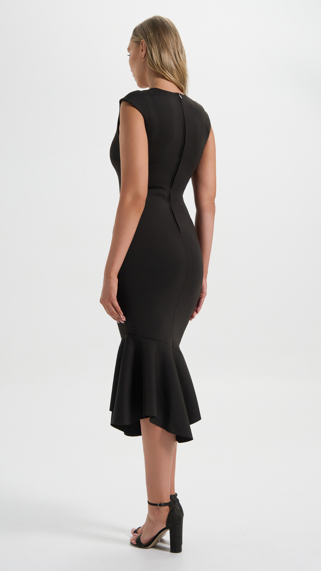 The Axis Dress in Black with mermaid-details perfect for cocktail events (Back Details)