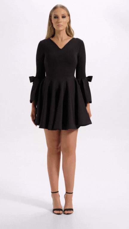 Boardroom to Cocktail Hour Dress in Black with the signature ribbon sleeve perfect for your cocktail events (Full Details)