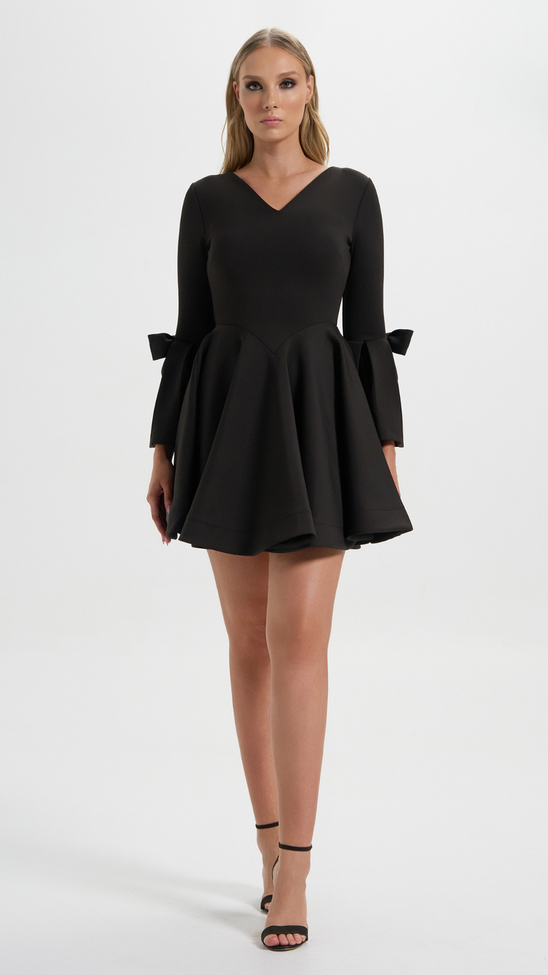 Boardroom to Cocktail Hour Dress in Black with the signature ribbon sleeve perfect for your cocktail events (Front Details)