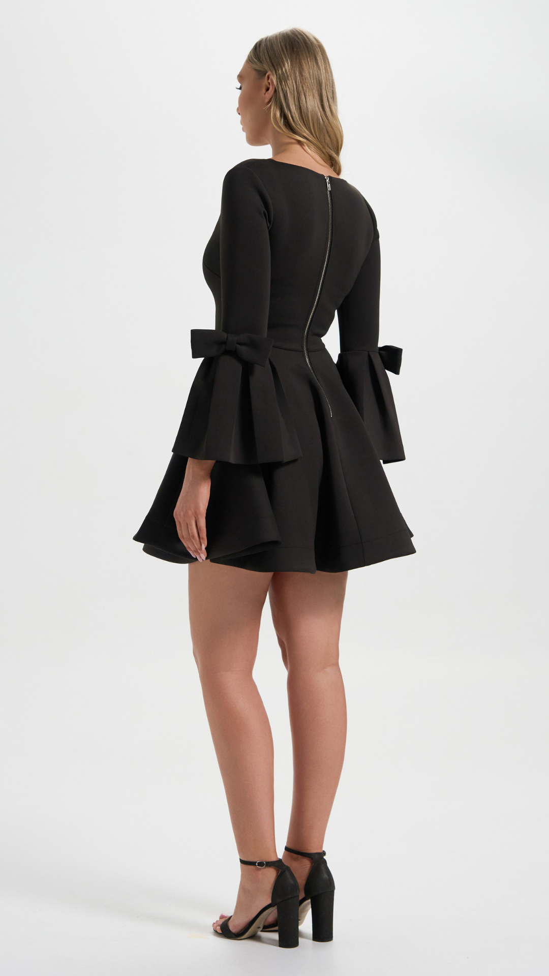 Boardroom to Cocktail Hour Dress in Black with the signature ribbon sleeve perfect for your cocktail events (Back Details)